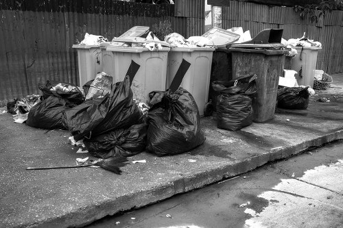 Workers sorting office waste into recycling streams in Forest Gate